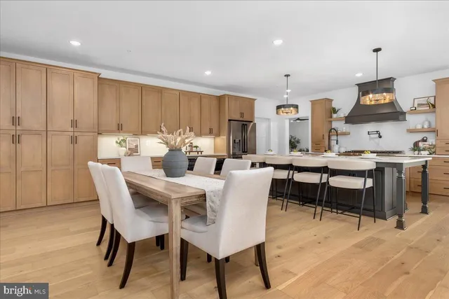 a bedroom with a bed and a table