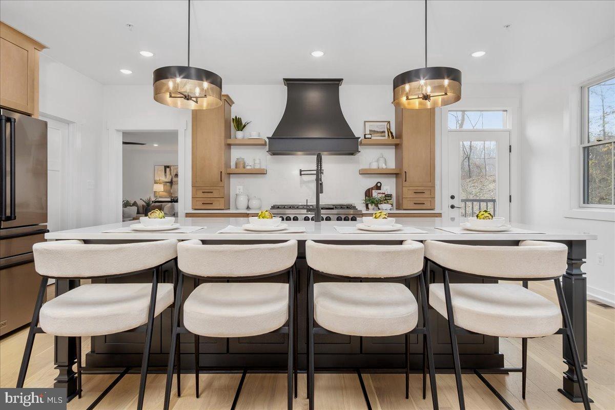 3520 Castle Way Davidsonville, MD 21035 - Photo 26 of 87 Modern kitchen with elegant island seating.