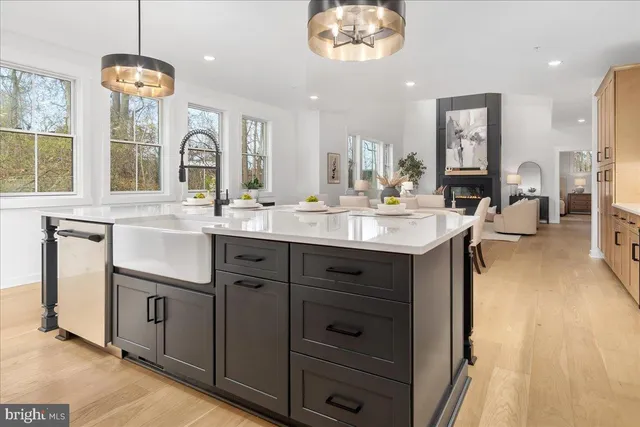 a bathroom with a sink vanity and mirror