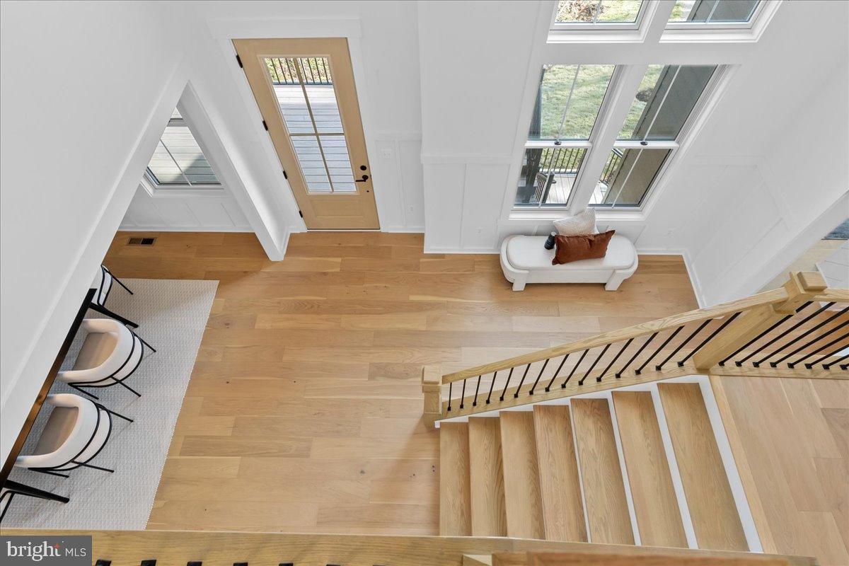 3520 Castle Way Davidsonville, MD 21035 - Photo 52 of 87 Bright and airy entryway with elegant stairs.