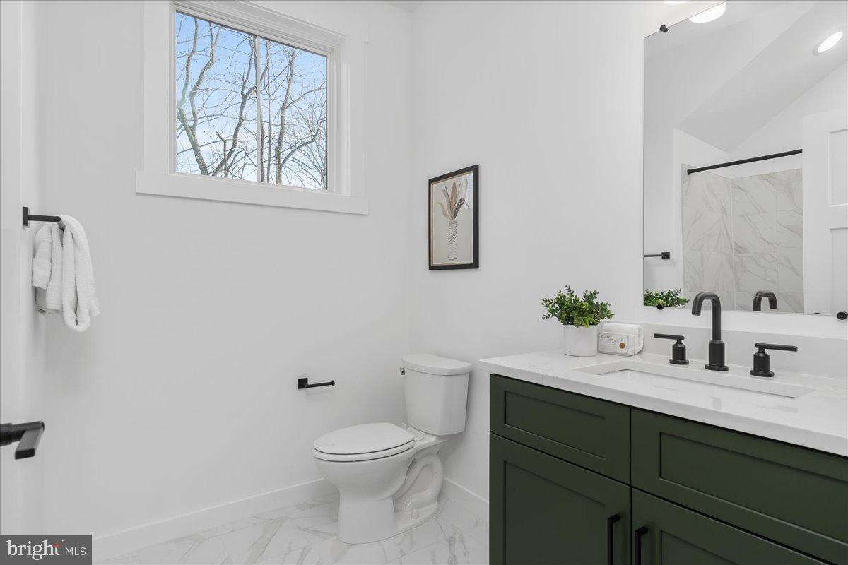 3520 Castle Way Davidsonville, MD 21035 - Photo 54 of 87 Ensuite bathroom with serene natural light.