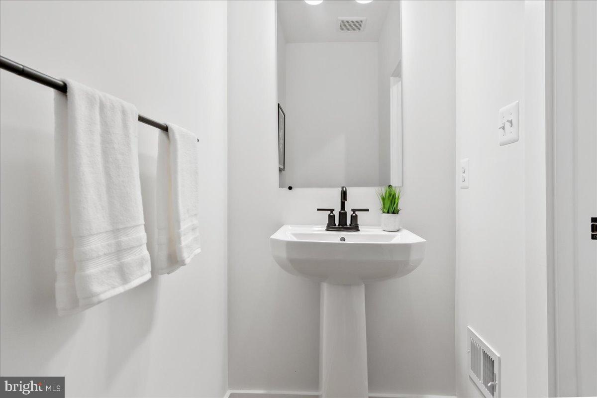 3520 Castle Way Davidsonville, MD 21035 - Photo 71 of 87 Sleek and modern powder room oasis.