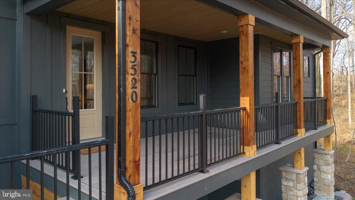 3520 Castle Way Davidsonville, MD 21035 - Photo 10 of 87 Charming porch with rustic elegance.