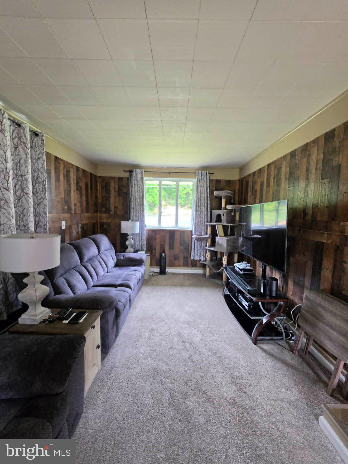 11275 Raystown Road Huntingdon, PA 16652 - Photo 9 of 29 Cozy living space with rustic charm.