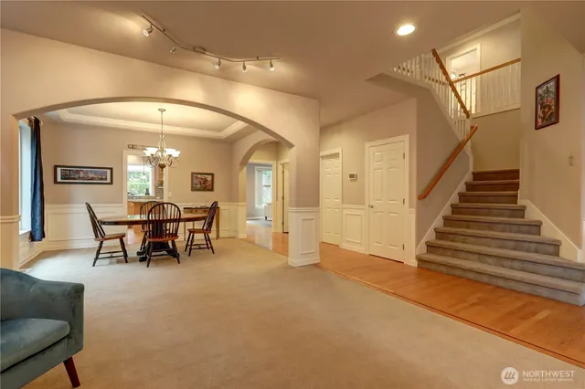 a view of a livingroom with furniture and a rug