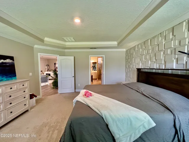 a bathroom with a double vanity sink mirror and shower