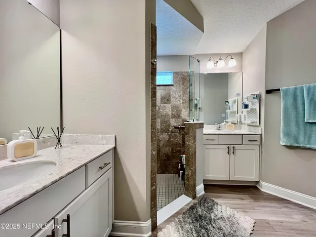 a living room filled with furniture and a large window