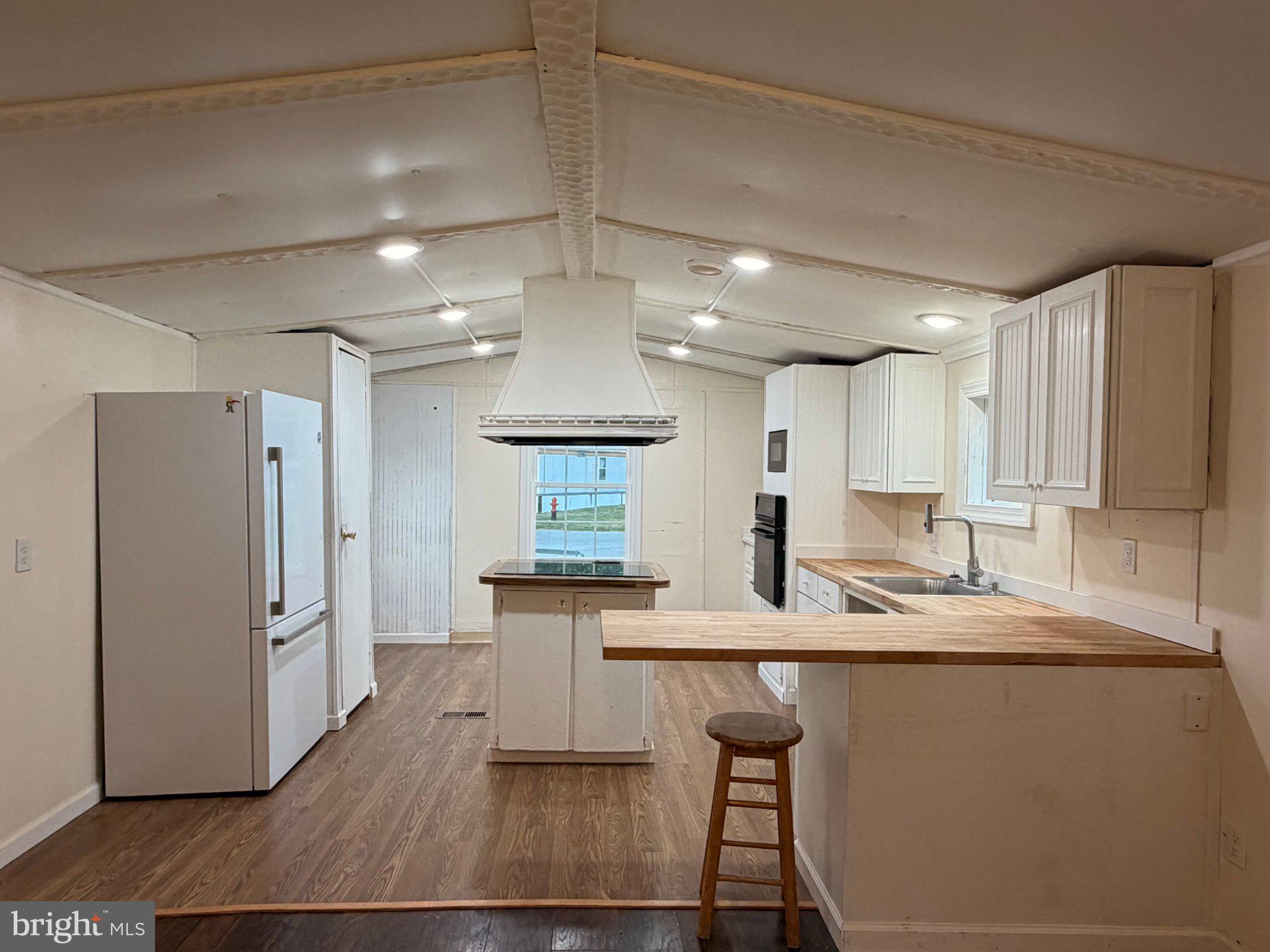 24 Carpenter Street, Unit 24 Dover, DE 19901 - Photo 19 of 27 Bright and airy kitchen space.