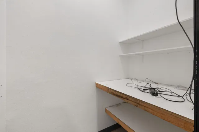 a bathroom with a sink a mirror and a toilet