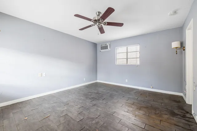 a view of an empty room with a window
