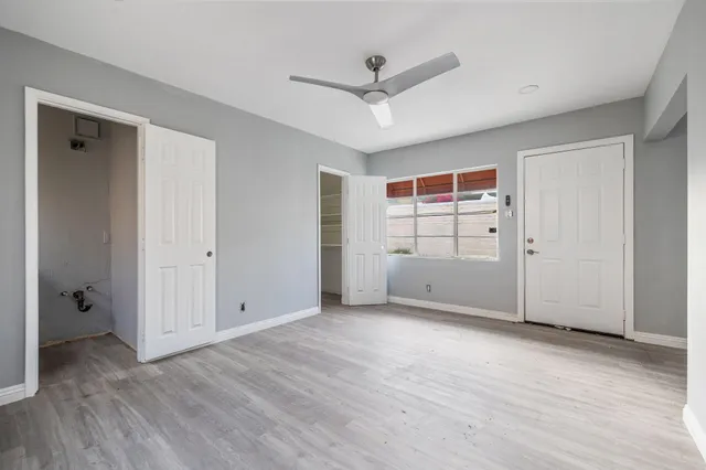 a view of an empty room and entryway