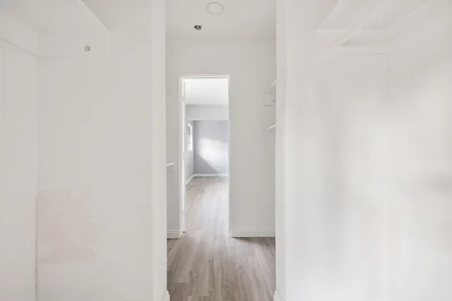 a view of a backyard with swimming pool