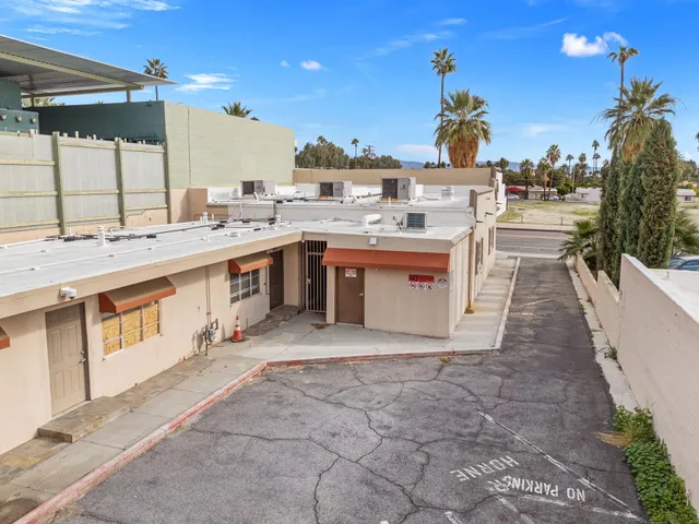 a view of swimming pool with outdoor seating