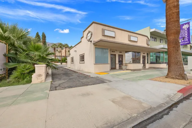 a room with a table and chairs