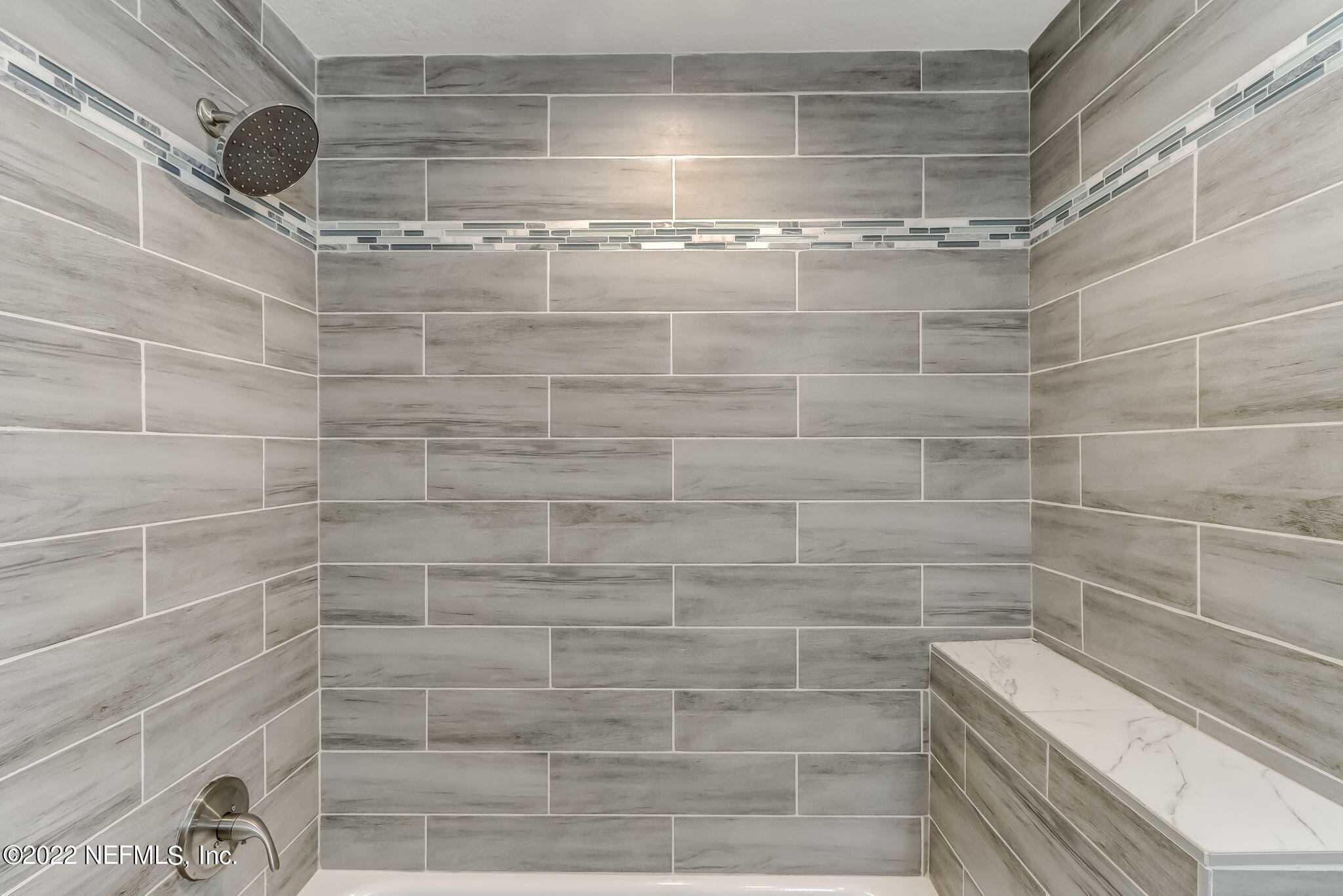 5218 Sunderland Road Jacksonville, FL 32210 - Photo 13 of 23 a bathroom with a shower