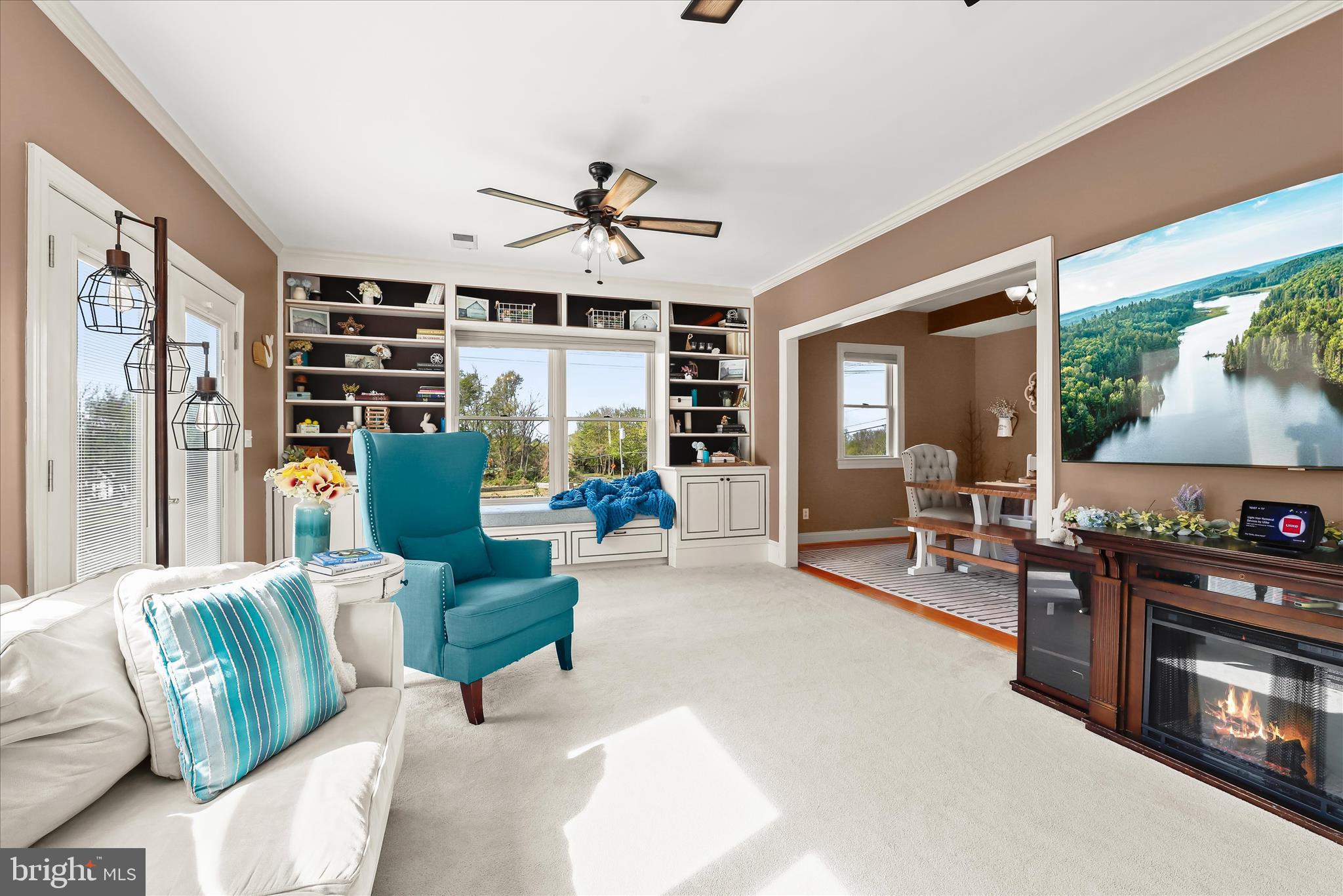13041 Penn Shop Road Mount Airy, MD 21771 - Photo 17 of 57 a living room with furniture and a flat screen tv