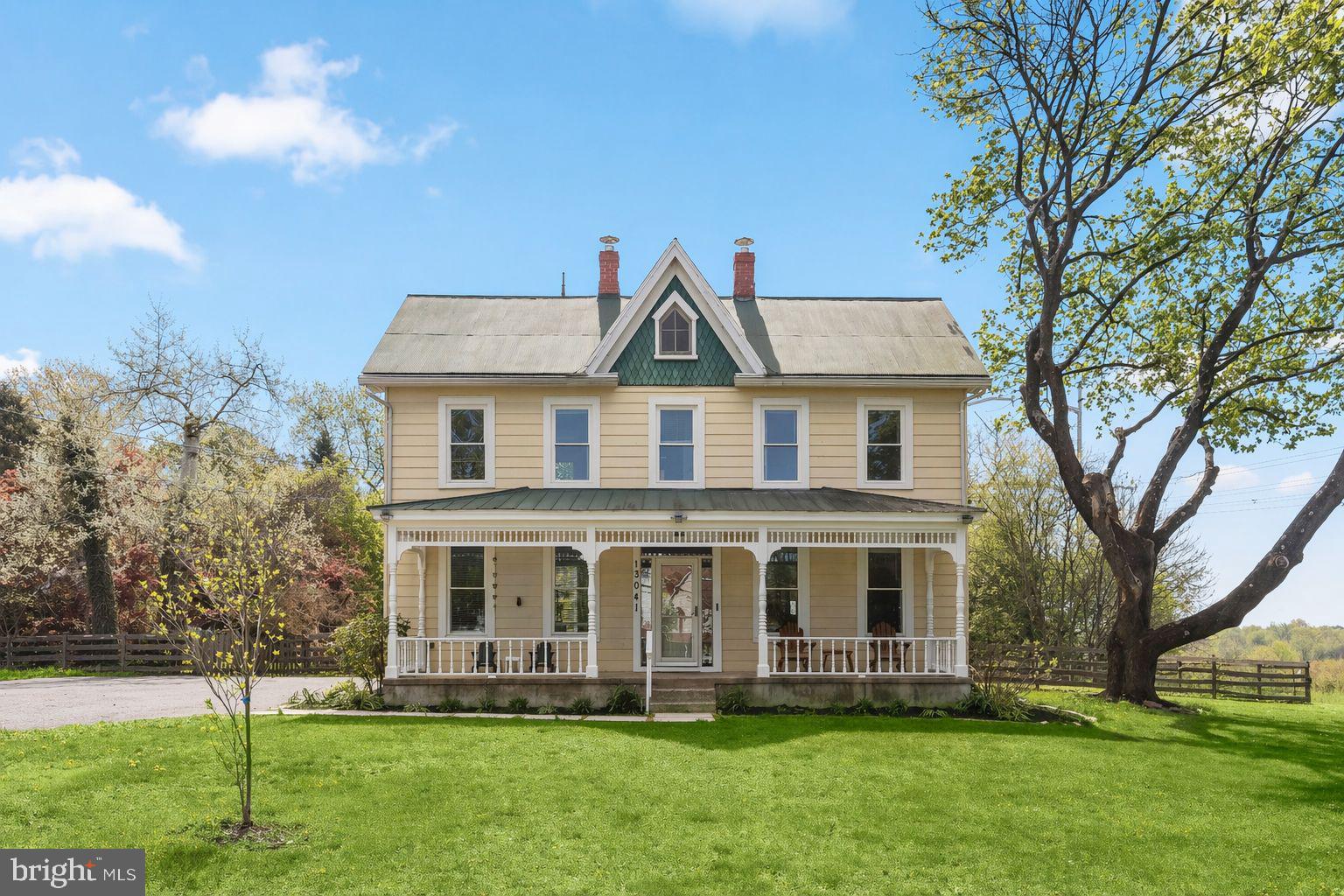 13041 Penn Shop Road Mount Airy, MD 21771 - Photo 2 of 57 a front view of a house with a yard