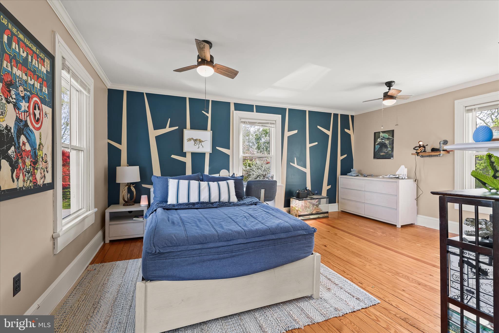 13041 Penn Shop Road Mount Airy, MD 21771 - Photo 34 of 57 a bedroom with a large bed a flat tv screen and a dresser