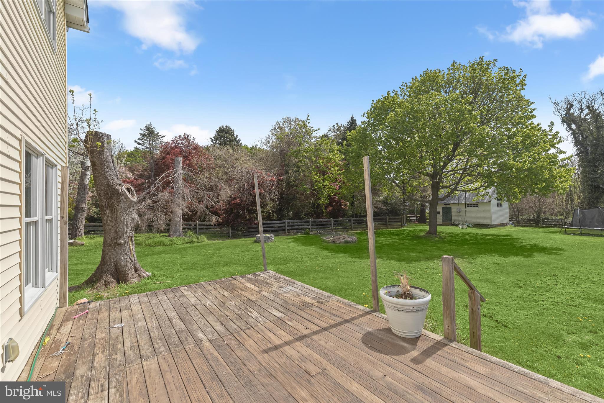 13041 Penn Shop Road Mount Airy, MD 21771 - Photo 40 of 57 a view of a backyard with wooden floor