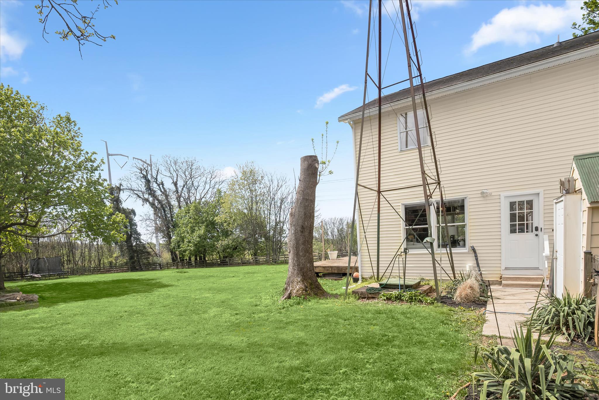13041 Penn Shop Road Mount Airy, MD 21771 - Photo 49 of 57 a view of a house with backyard and a tree