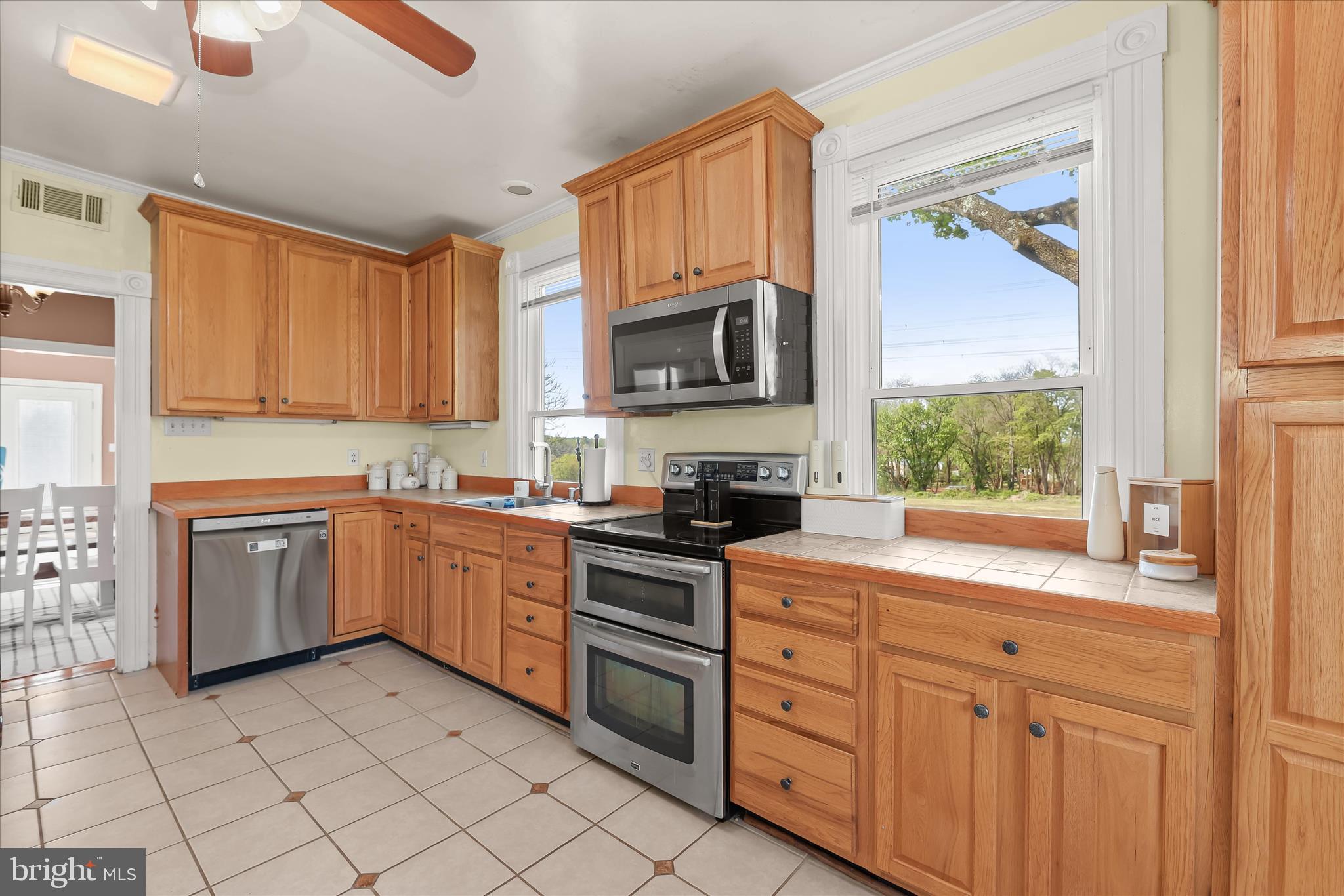 13041 Penn Shop Road Mount Airy, MD 21771 - Photo 10 of 57 a kitchen with cabinets appliances a sink and a window