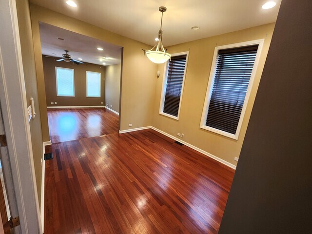 3610 South Seeley Avenue Chicago, IL 60609 - Photo 15 of 26 a view of livingroom with hardwood floor and front door