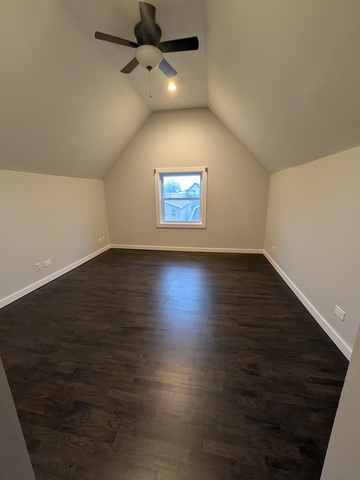 3610 South Seeley Avenue Chicago, IL 60609 - Photo 21 of 26 an empty room with wooden floor and windows