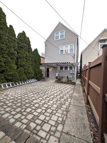 3610 South Seeley Avenue Chicago, IL 60609 - Photo 25 of 26 a front view of a house with a yard