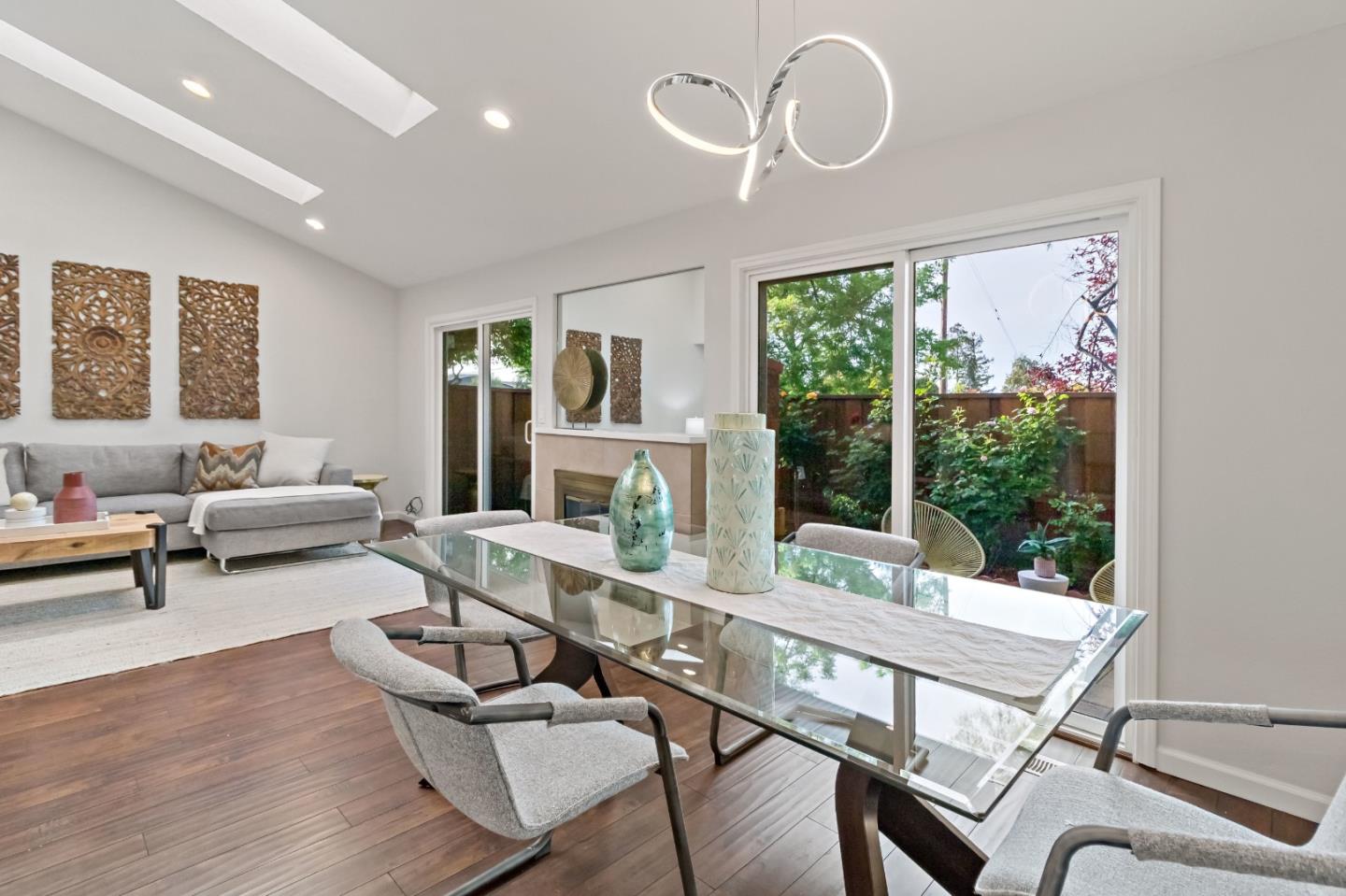 20179 NW Square Cupertino, CA 95014 - Photo 16 of 50 a living room with furniture fireplace and a large window