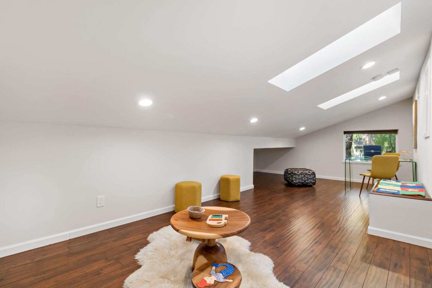 20179 NW Square Cupertino, CA 95014 - Photo 24 of 50 a living room with furniture and a wooden floor