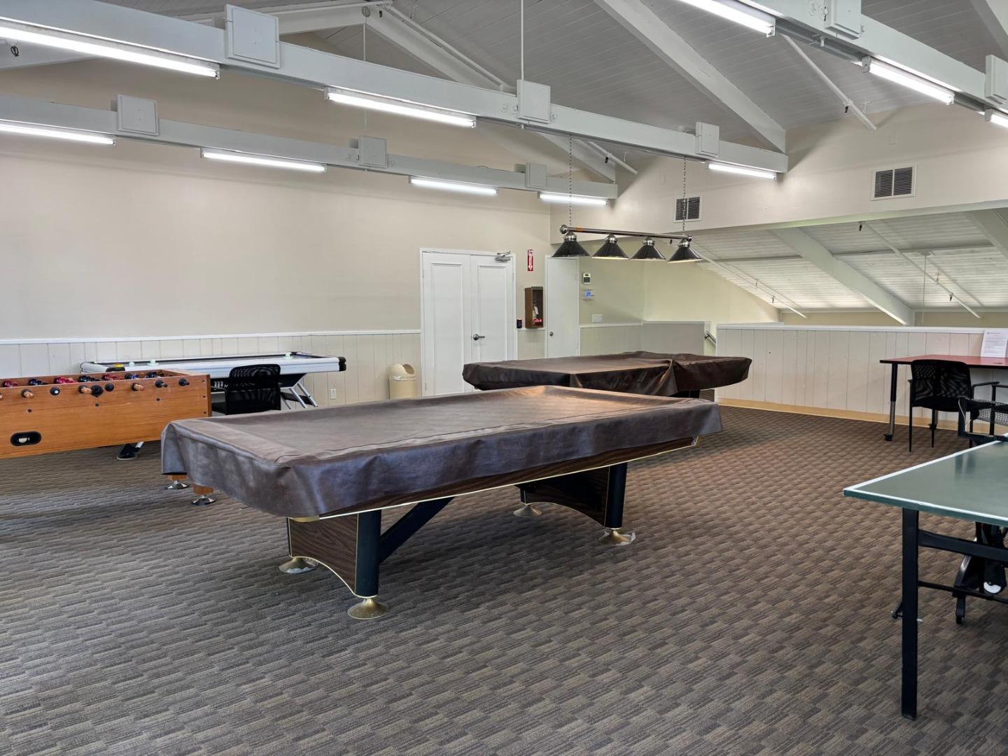 20179 NW Square Cupertino, CA 95014 - Photo 43 of 50 a living room with stainless steel furniture table tennis table and wooden floor