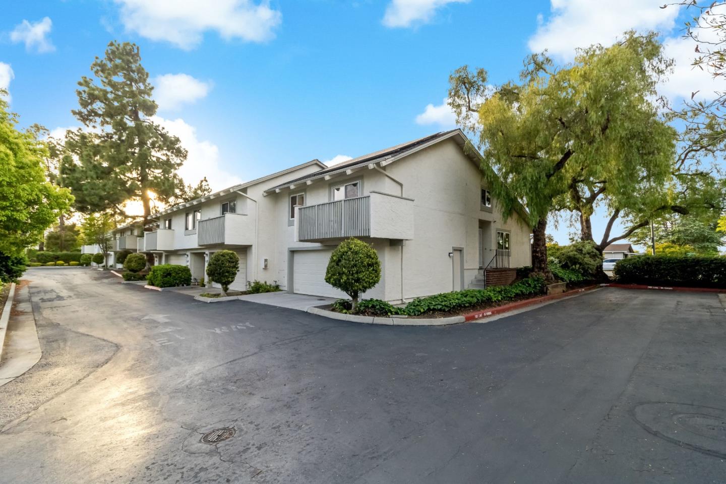 20179 NW Square Cupertino, CA 95014 - Photo 6 of 50 a view of a house with a small yard and palm trees