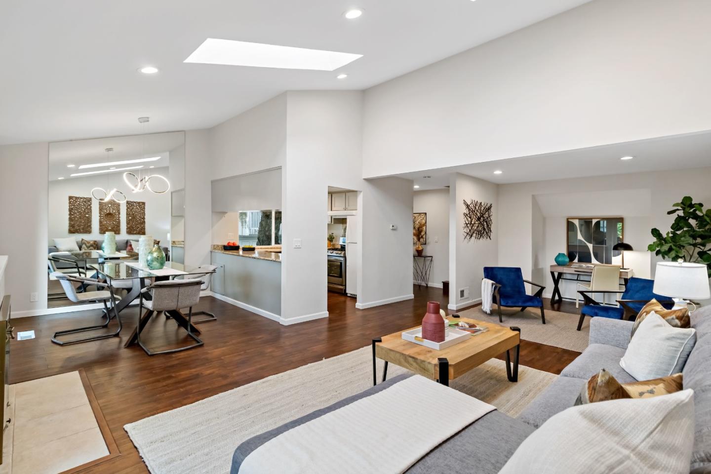 20179 NW Square Cupertino, CA 95014 - Photo 8 of 50 a living room with furniture kitchen view and a wooden floor