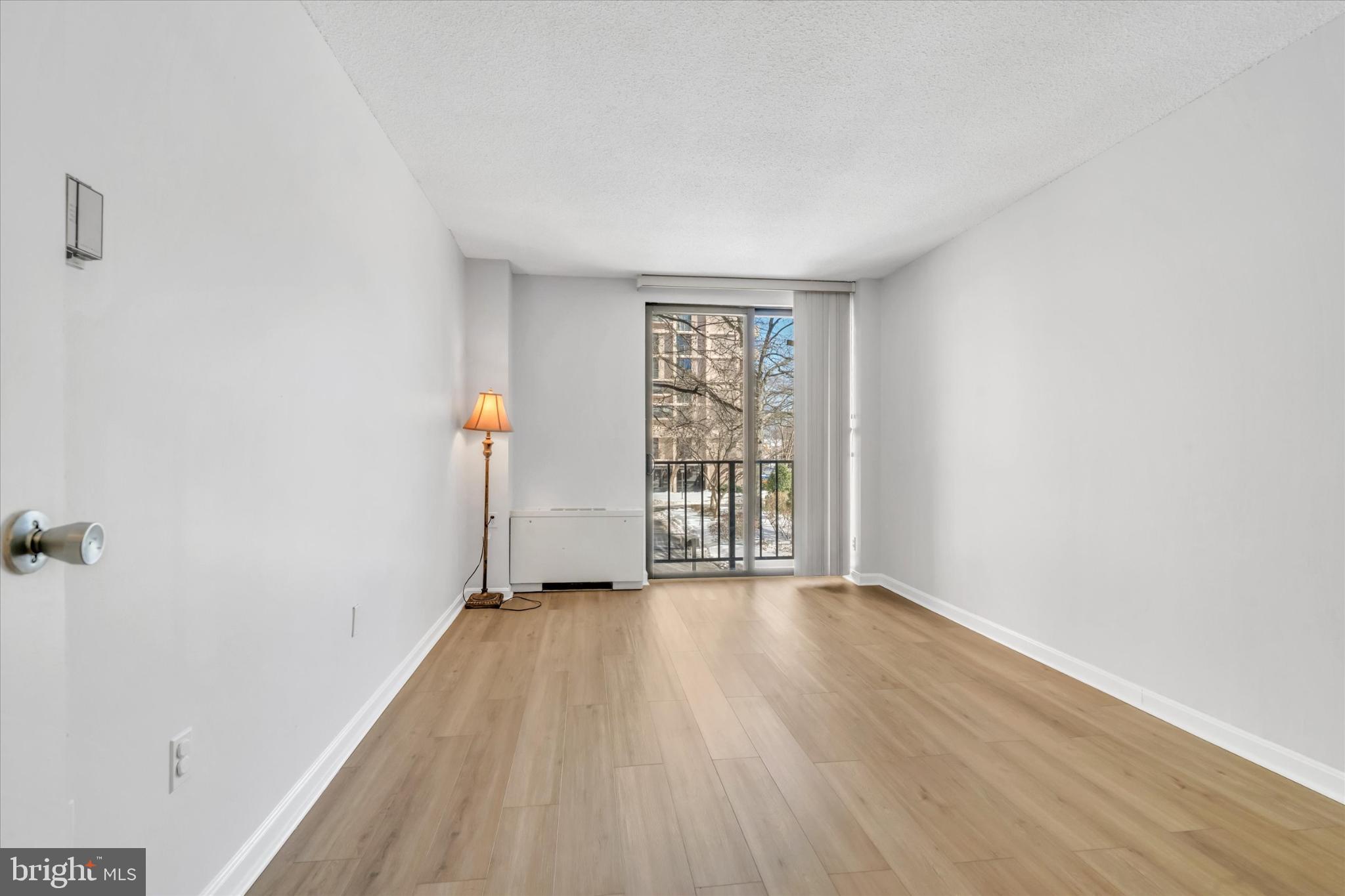 4141 North Henderson Road, Unit 104 Arlington, VA 22203 - Photo 13 of 23 Bright and airy bedroom with natural light.