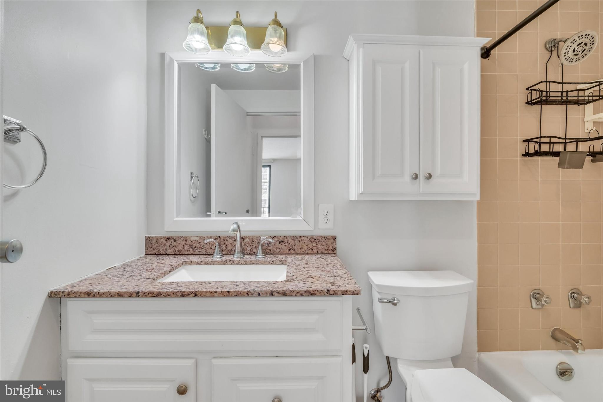 4141 North Henderson Road, Unit 104 Arlington, VA 22203 - Photo 16 of 23 Charming bathroom with modern finishes.
