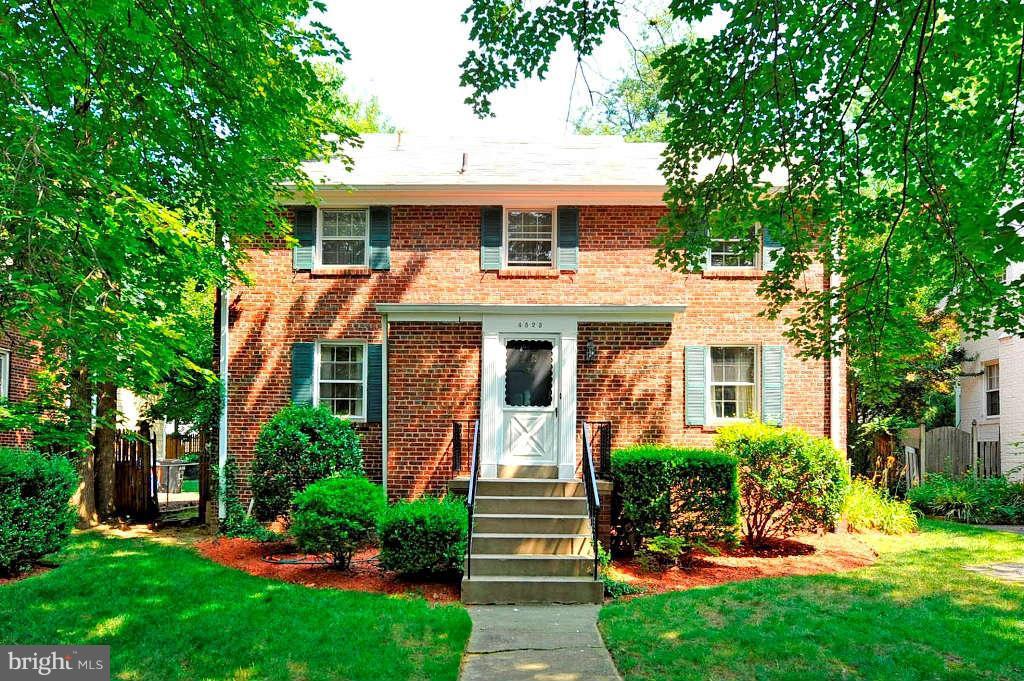 4523 Sleaford Road Bethesda, MD 20814 - Photo 1 of 23 a front view of a house with a yard