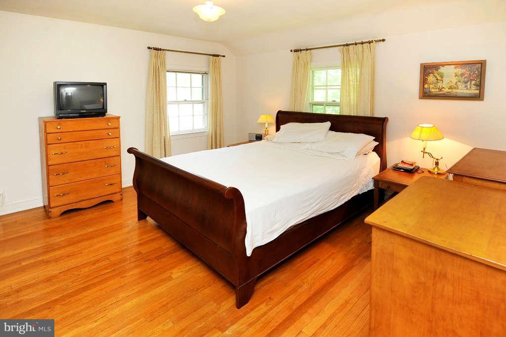 4523 Sleaford Road Bethesda, MD 20814 - Photo 11 of 23 a bedroom with a bed and window