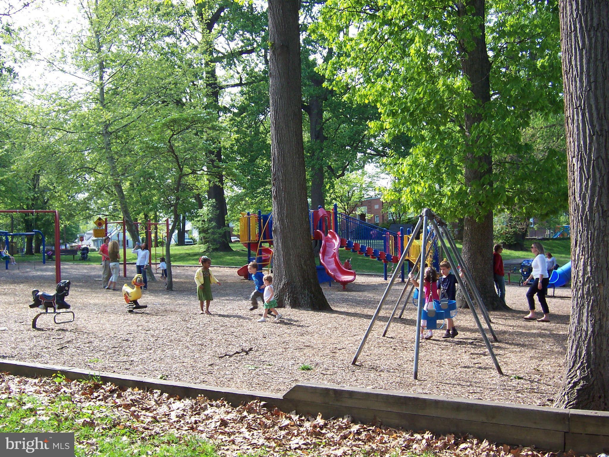4523 Sleaford Road Bethesda, MD 20814 - Photo 21 of 23 a view of a park with swings and slides