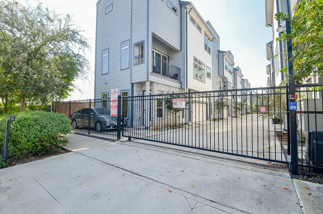 a view of a brick building from a roof deck