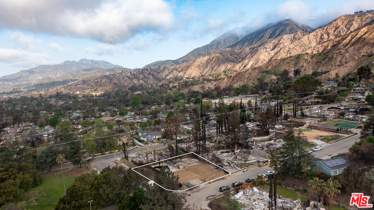 3363 Monterosa Drive Altadena, CA 91001 - Photo 8 of 13 an aerial view of residential house with parking space and mountain view in back