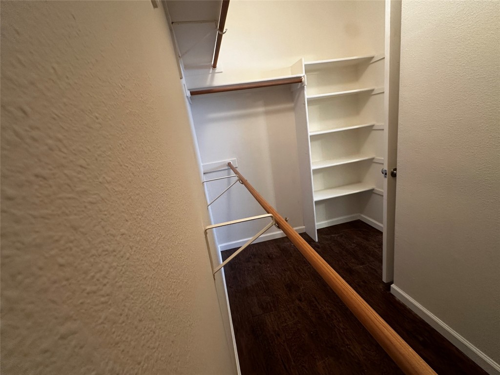 1041 Disraeli Circle Pflugerville, TX 78660 - Photo 21 of 29 a view of walk in closet with empty racks