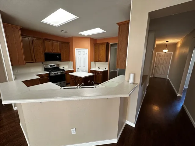 a living room with a couch and a flat screen tv