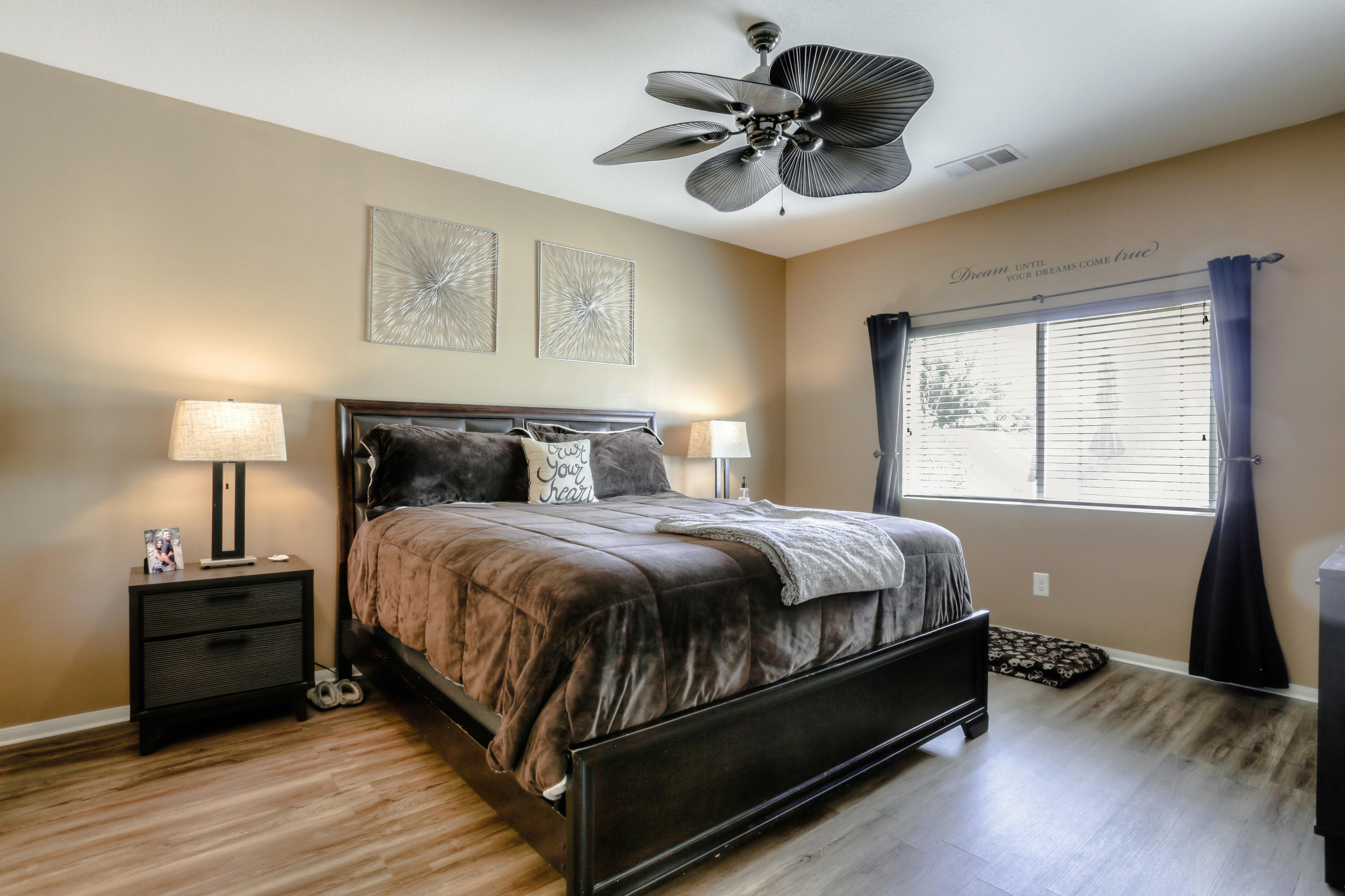 35880 Raphael Drive Palm Desert, CA 92211 - Photo 16 of 28 a bedroom with a bed and a window