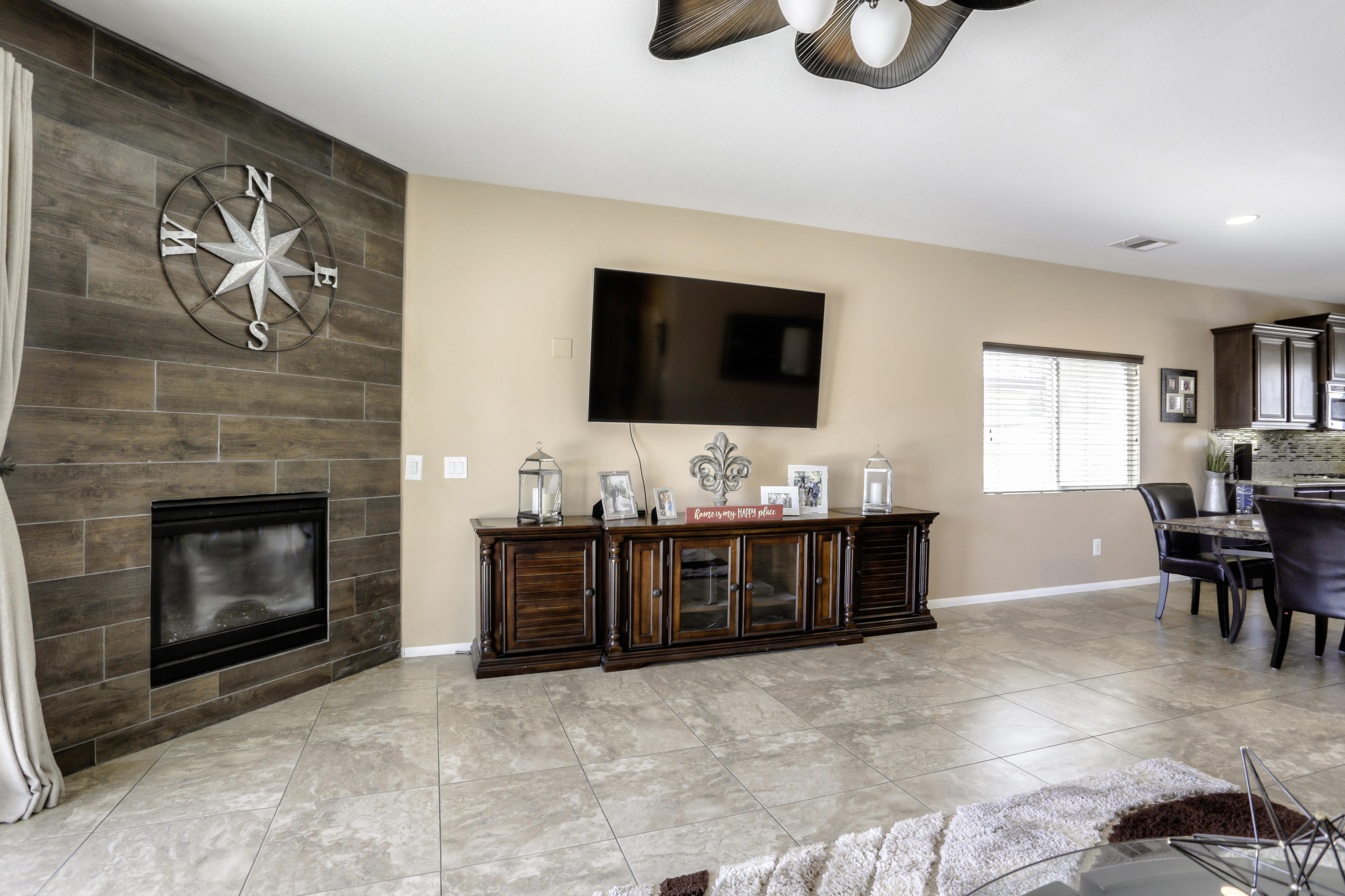 35880 Raphael Drive Palm Desert, CA 92211 - Photo 7 of 28 a living room with furniture and a flat screen tv