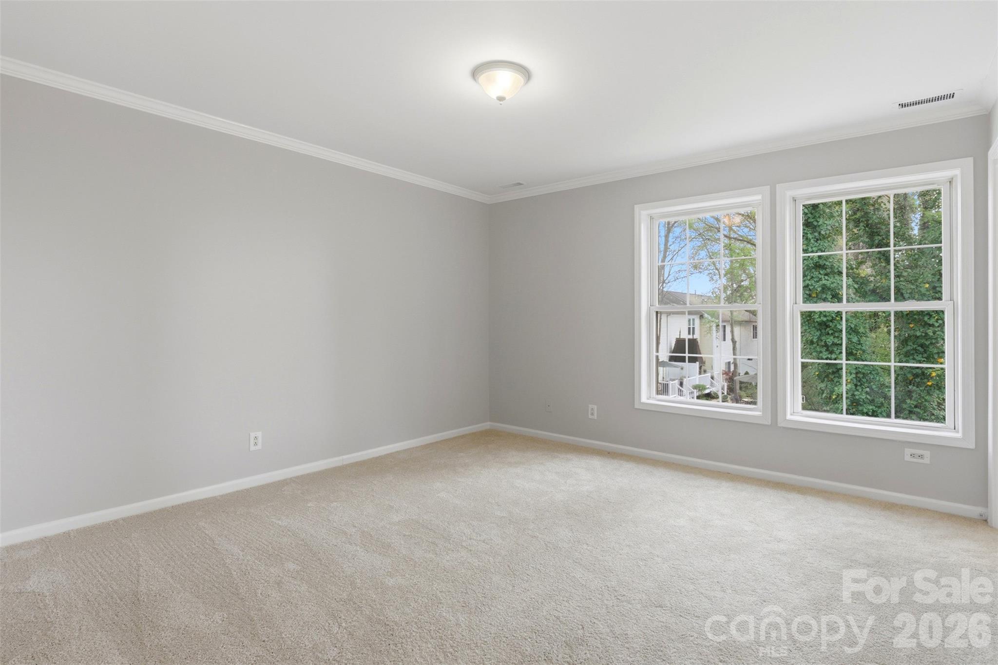 7019 Walnut Ridge Court Charlotte, NC 28273 - Photo 13 of 30 an empty room with a window