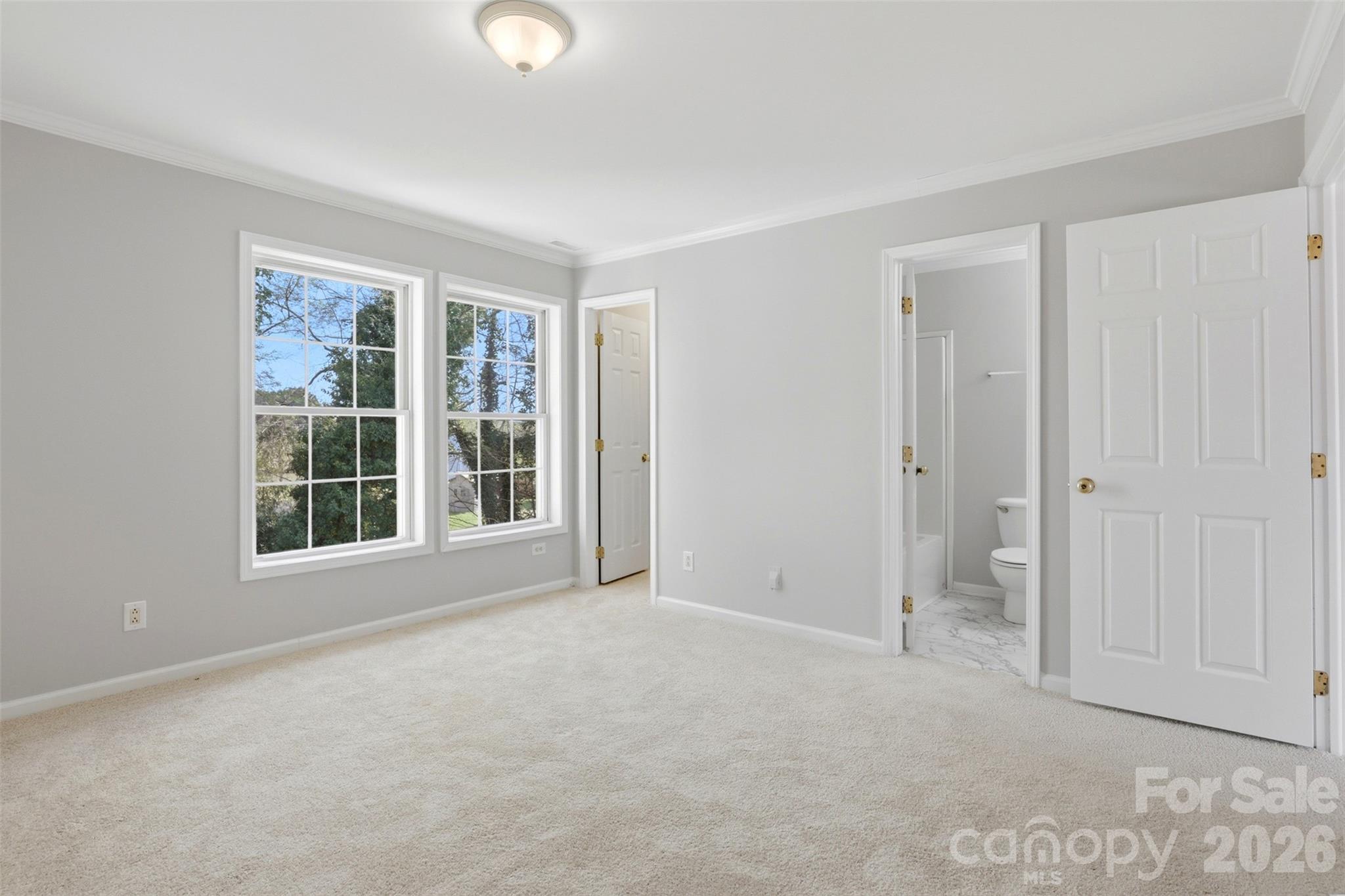7019 Walnut Ridge Court Charlotte, NC 28273 - Photo 14 of 30 a view of an empty room with a window