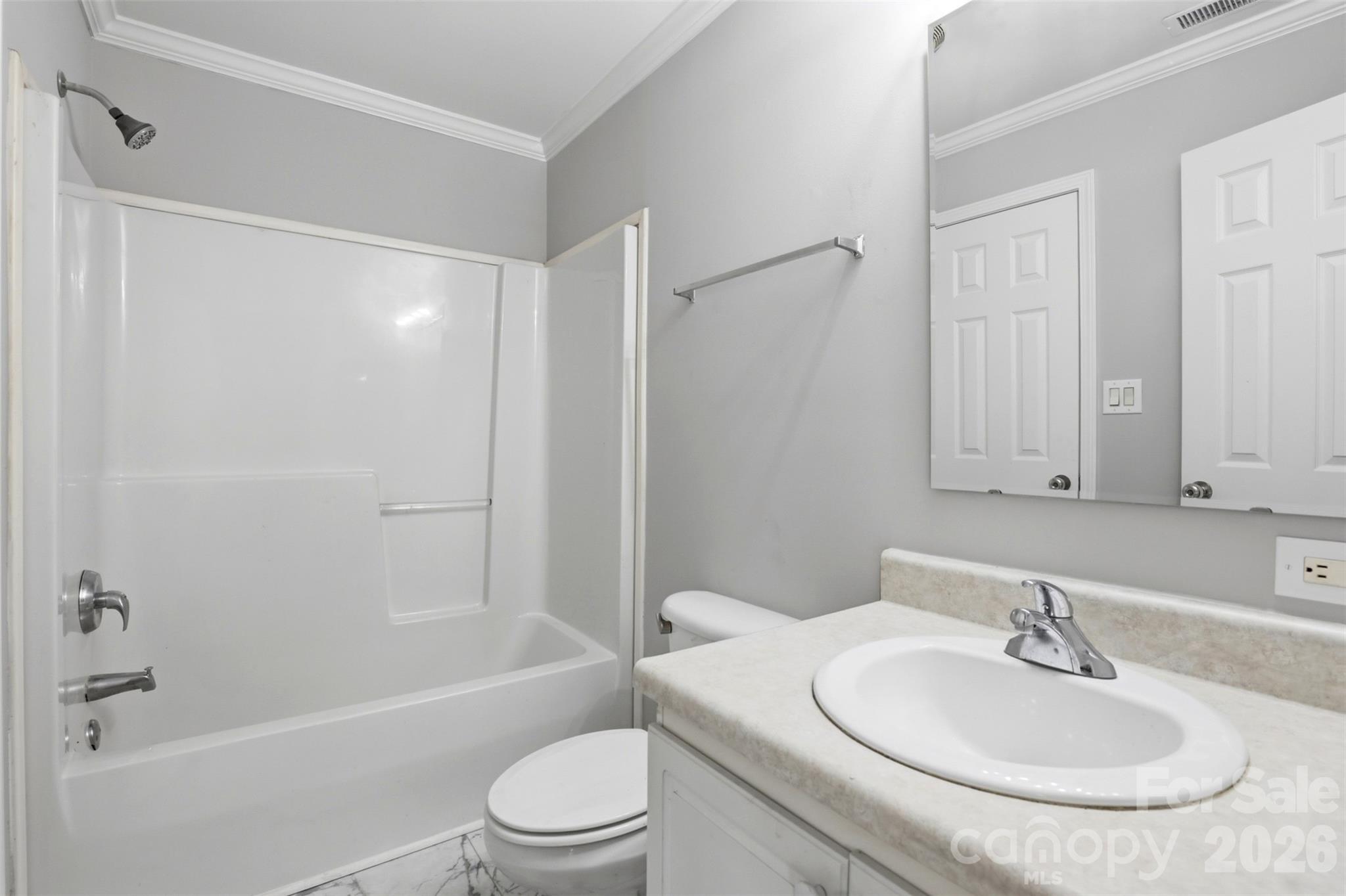 7019 Walnut Ridge Court Charlotte, NC 28273 - Photo 16 of 30 a bathroom with a sink a toilet and shower