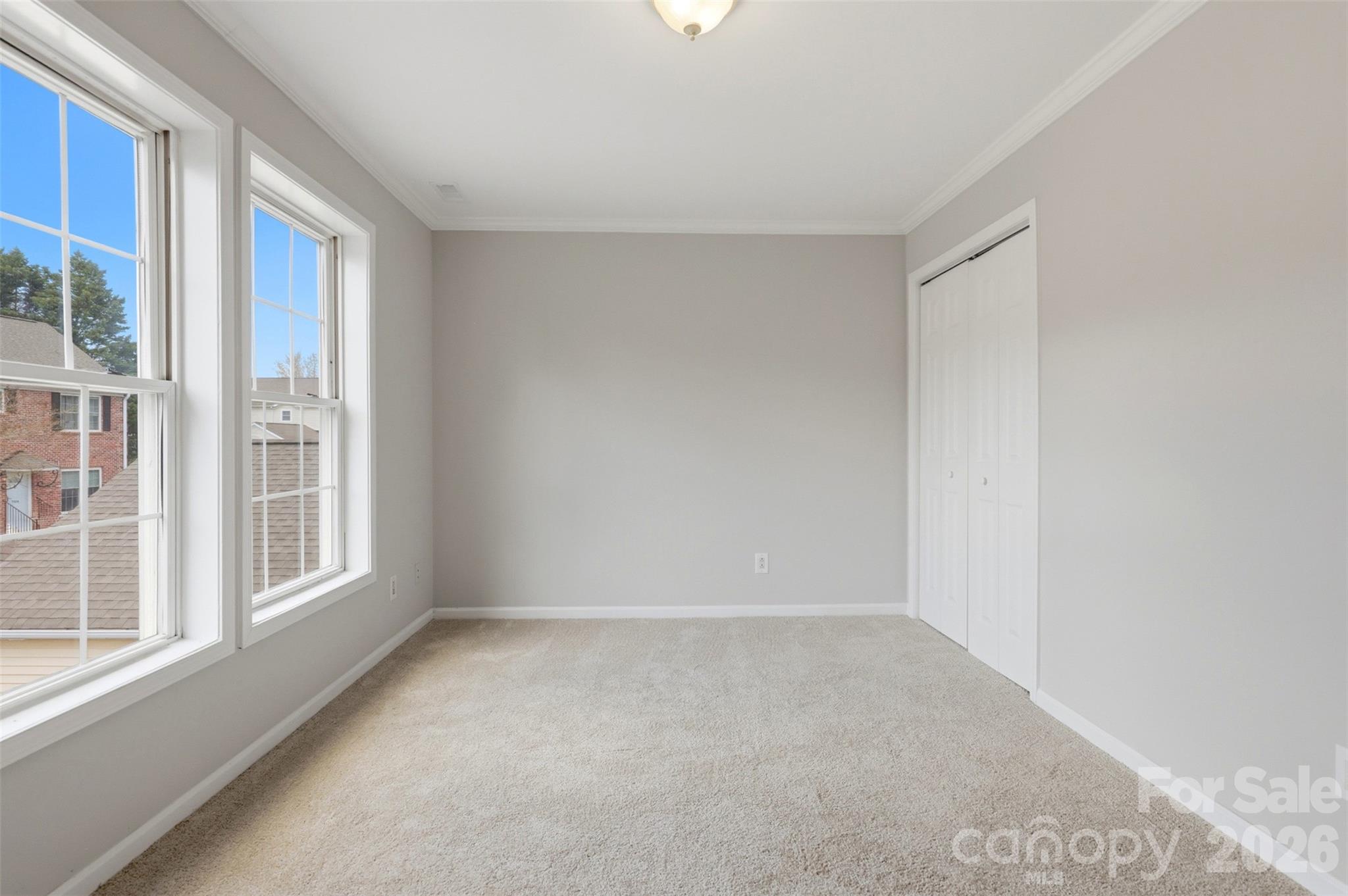 7019 Walnut Ridge Court Charlotte, NC 28273 - Photo 19 of 30 a view of an empty room with a window