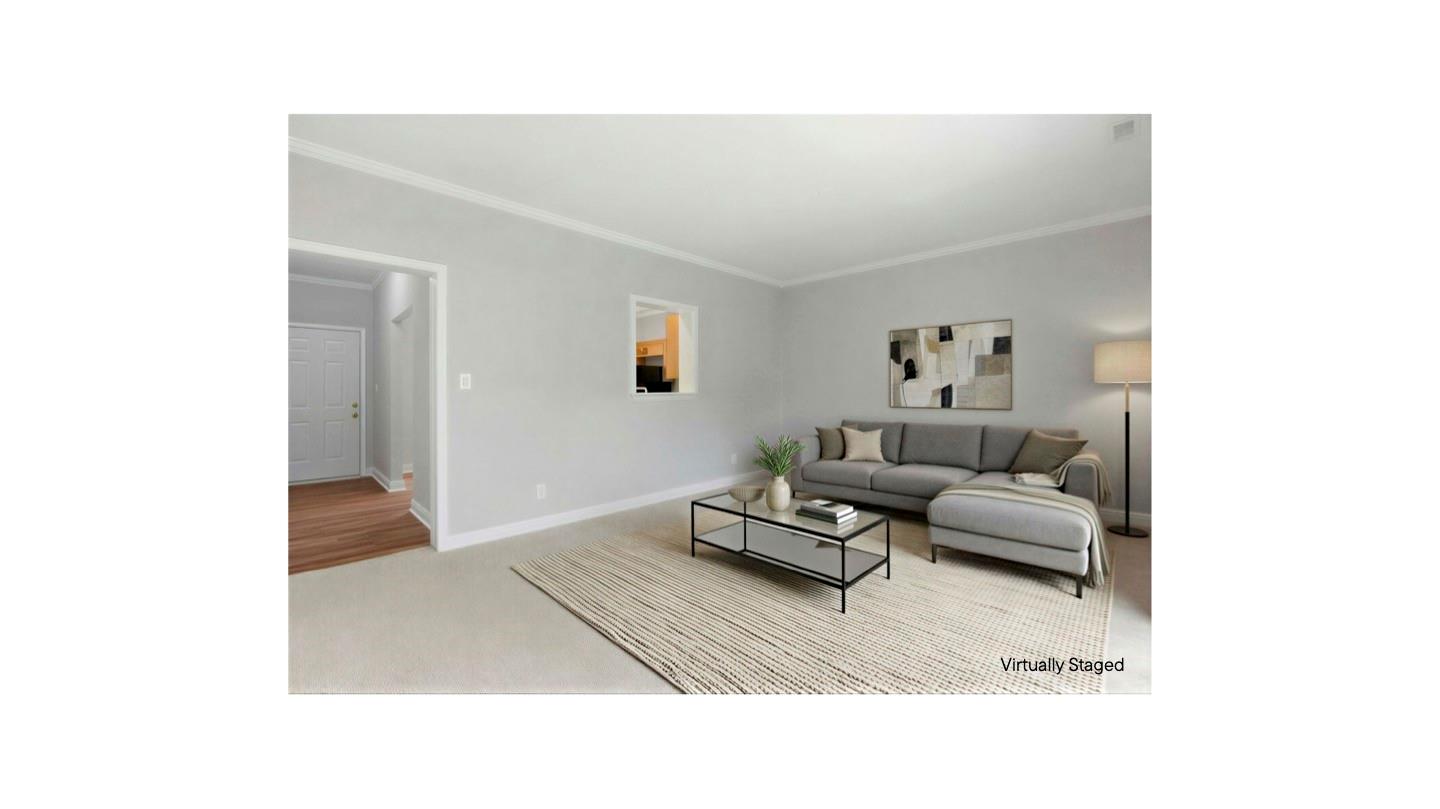 7019 Walnut Ridge Court Charlotte, NC 28273 - Photo 6 of 30 a living room with furniture and a rug