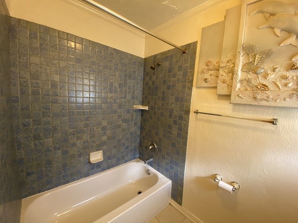 902 Appomattox Drive Spring, TX 77380 - Photo 13 of 18 a bathroom with a bathtub
